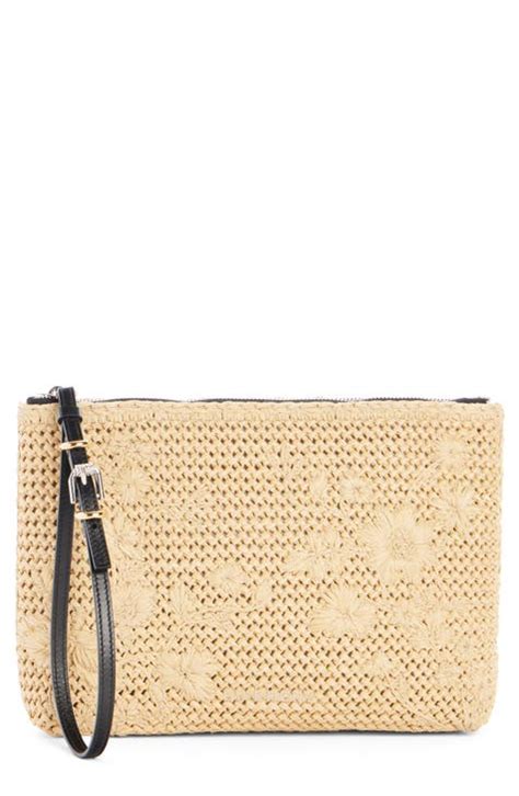 Voyou pouch in raffia with floral embroidery 